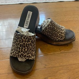 Size 7, leopard slip on sandals